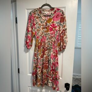 New dress without tags. Size medium. Never worn.